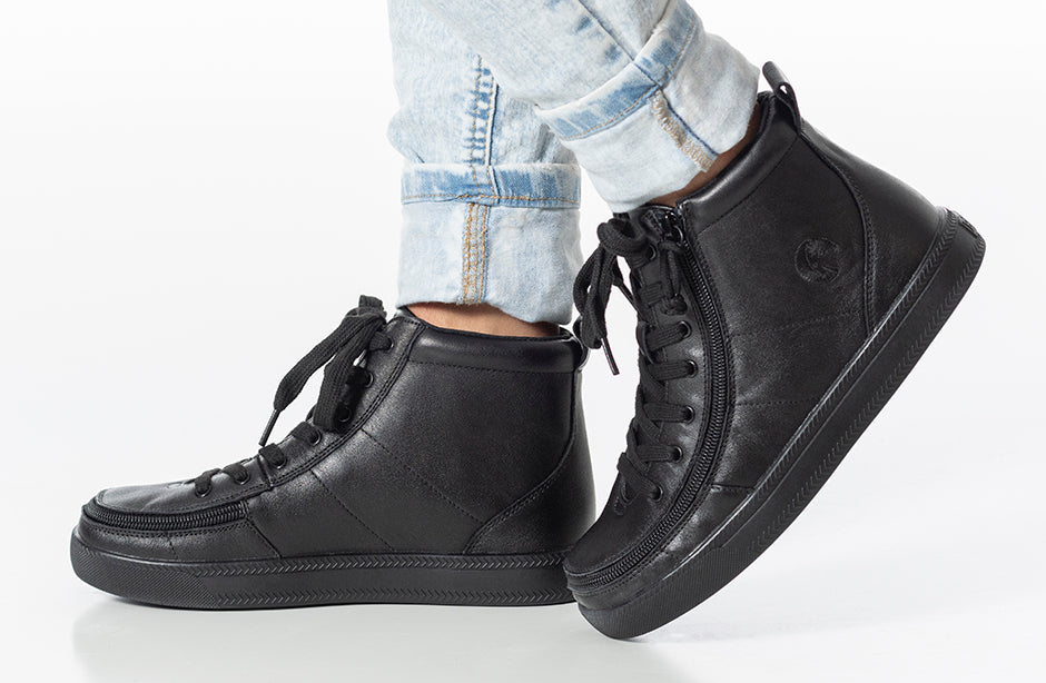 Black to the Floor Leather BILLY Classic Lace High Tops on feet, showcasing the stylish leather design suitable for kids, with adjustable laces and removable inserts.