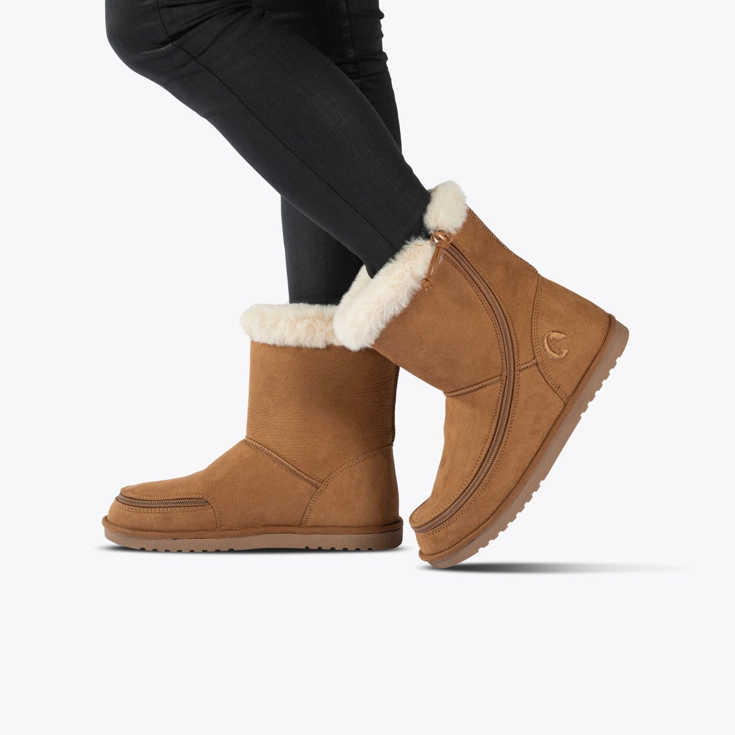 Toddlers - Chestnut BILLY Cozy II mid-calf boots with shearling lining, side zipper, and easy FlipTop Technology, worn with slim black pants.
