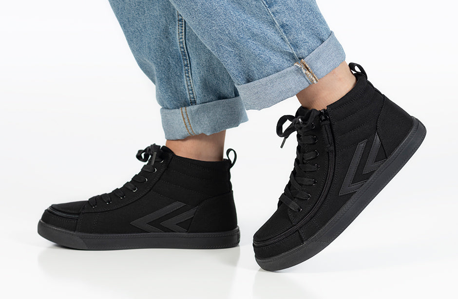 Black to the Floor BILLY CS Sneaker High Tops with functional laces, removable insoles, and a wraparound zipper, showcased on a person's feet.