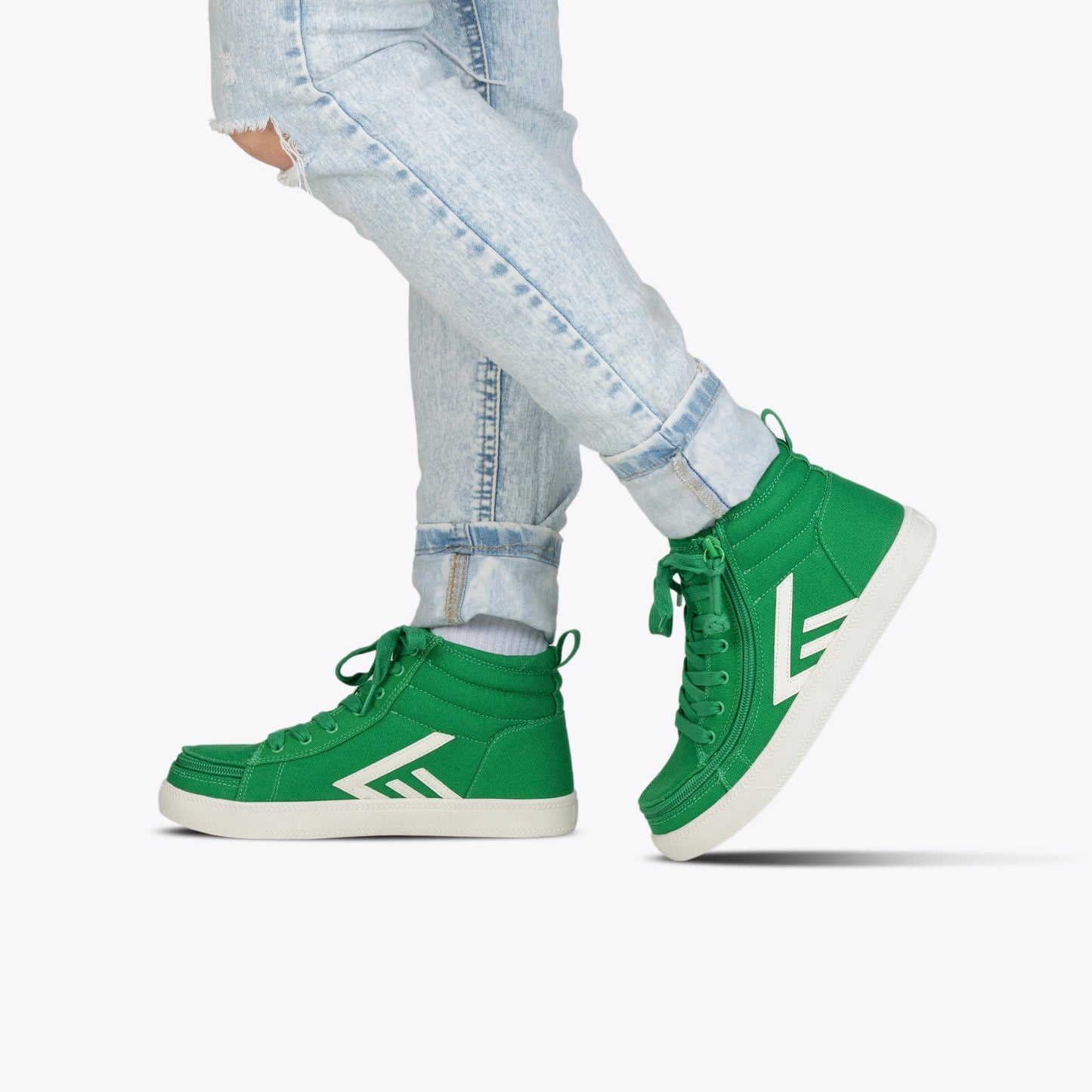 Green/White BILLY CS High Tops, featuring a wraparound zipper and removable insoles, worn with jeans, highlighting their accessibility and stylish design.