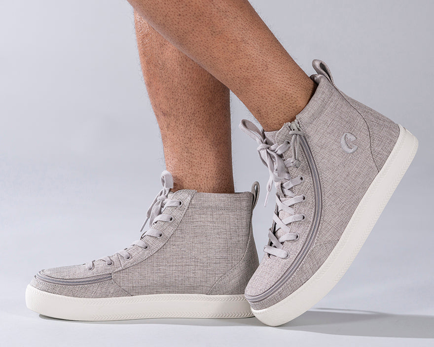Men's Grey Jersey BILLY Classic Lace Highs, featuring grey sneakers with chambray linen upper, adjustable laces, and rubber outsole, worn on a person's feet.