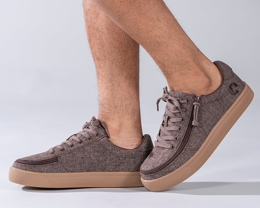 Men's Brown Jersey BILLY Classic Lace Lows, featuring chambray linen upper, visible adjustable cotton-blend laces, and rubber outsole, shown on a person's feet.