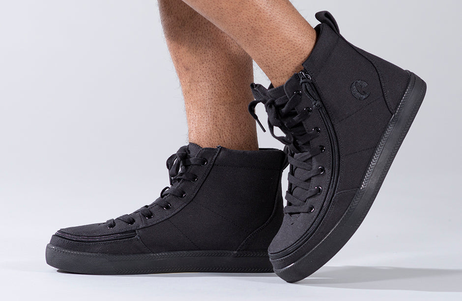 Men's Black to the Floor BILLY Classic Lace Highs featuring a padded collar and wraparound zipper, shown worn on a person's feet.