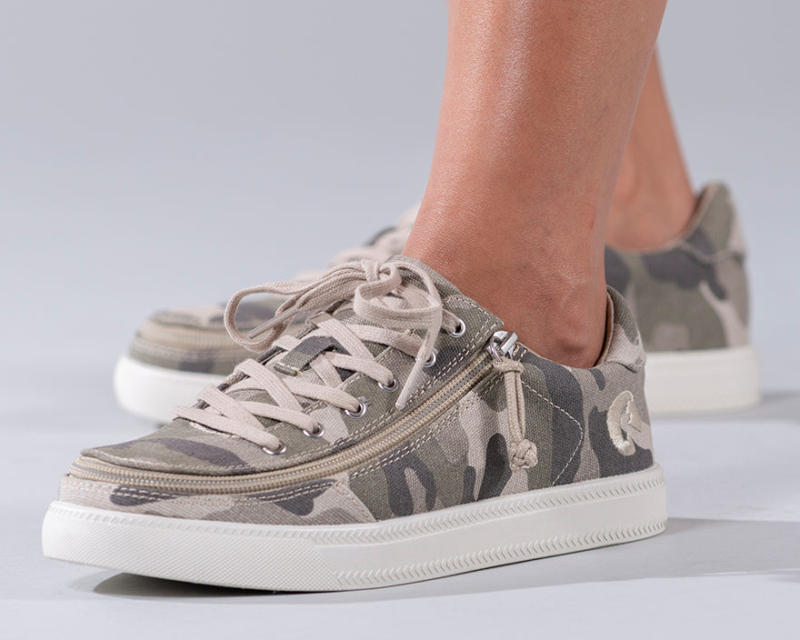 Women's Natural Camo BILLY Classic Lace Lows, featuring printed canvas upper, white sole, rubber tread outsole, and adjustable cotton-blend laces, offering style and comfort.